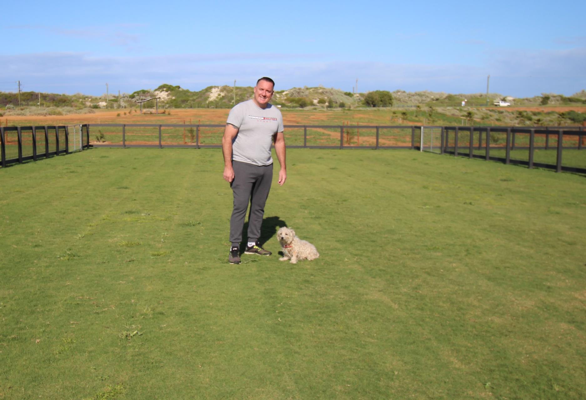 City of Greater Geraldton Mayor Shane Van Styn and his pooch Bella enjoying the new off lead dog area located in the Leonard T Green Memorial Park in Mahomets Flats.