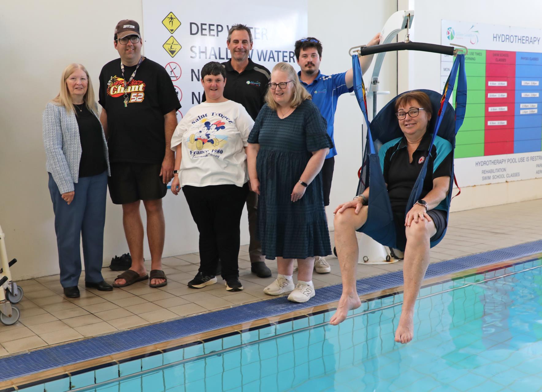 Midwest Community Living Association donation to Aquarena